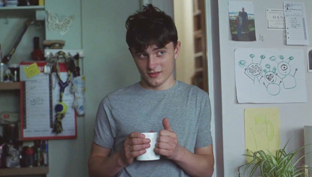 young-man-drinking-from-cup